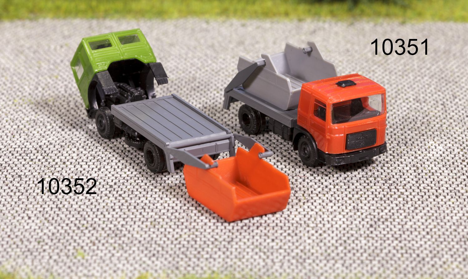 Schirmer 10351 - LkW MAN mit Absetzcontainer, Fahrerhaus rot