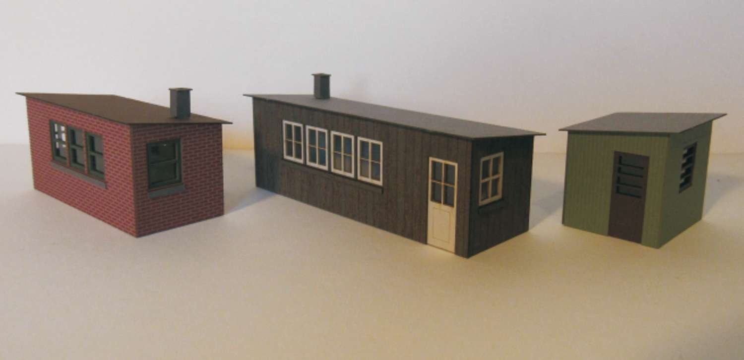 Laffont T1401 - 3 Betriebswerkhütten mit Ziegel-, Holz- und Wellblechfasade