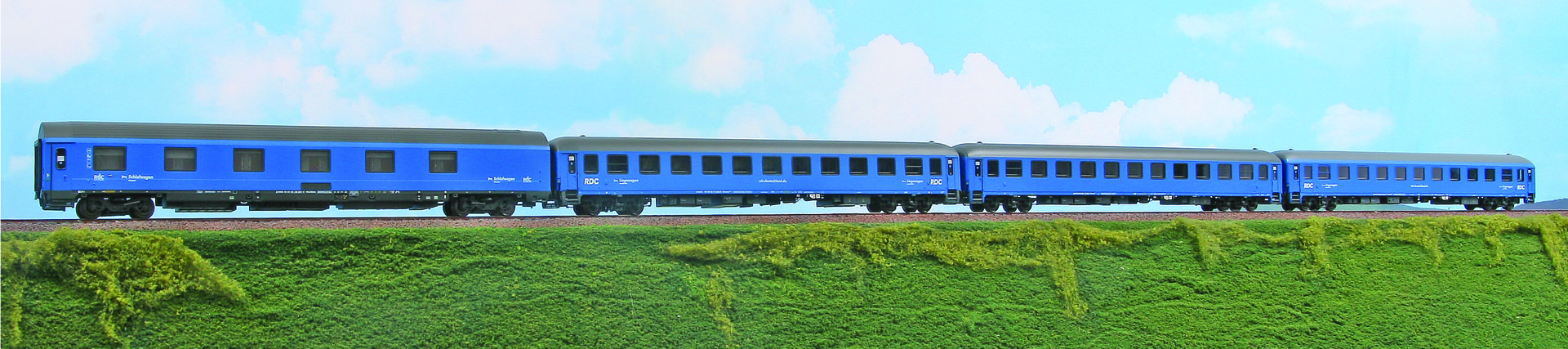 ACME AC 55312 - 4er Set Personenwagen 'AutoReiseZug Lörrach - Hamburg', RDC, Ep.VI