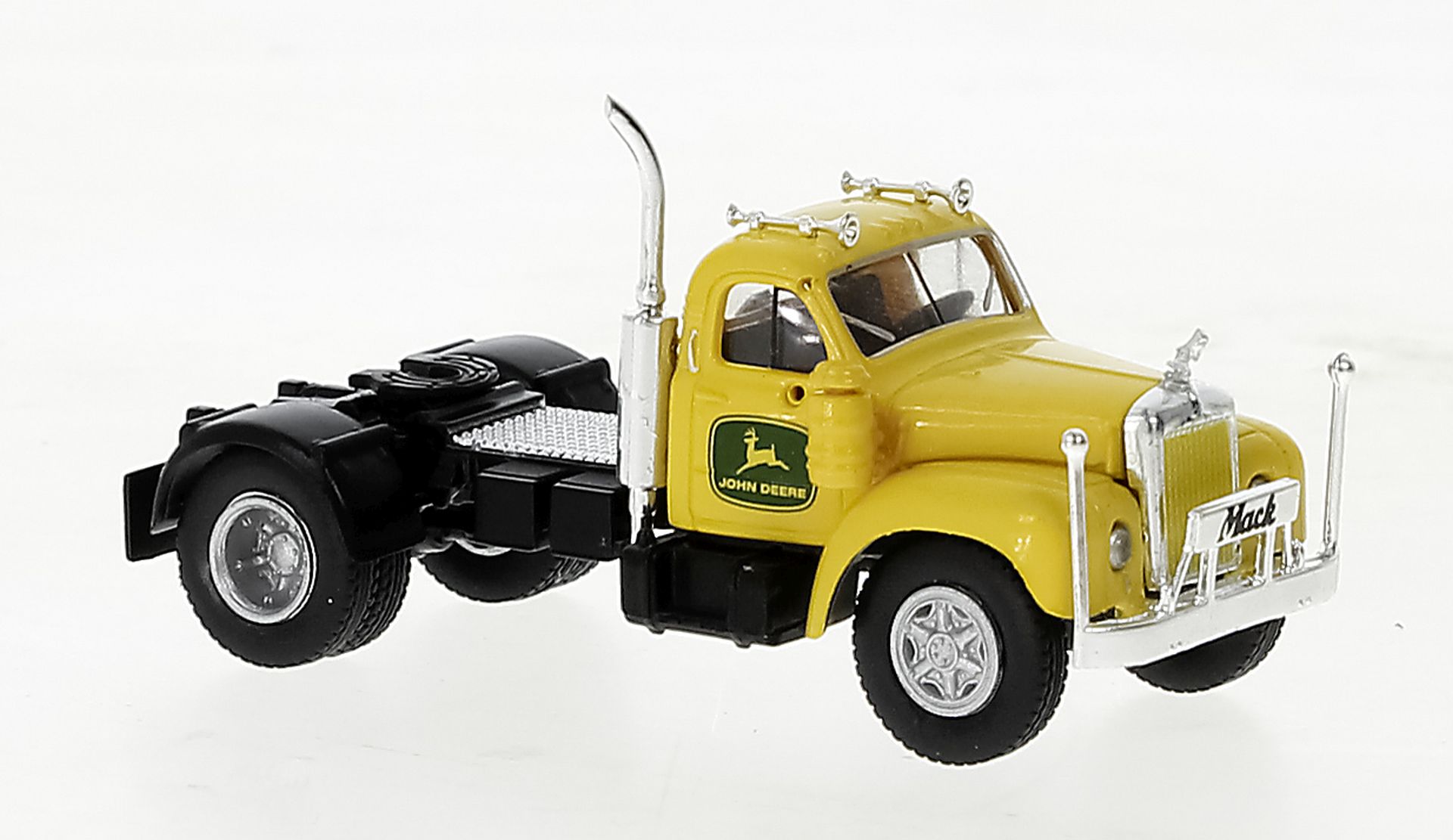 Brekina 85978 - Mack B 61 gelb, John Deere, 1953 Brekina 85978 - Mack B 61 gelb, John Deere, 1953